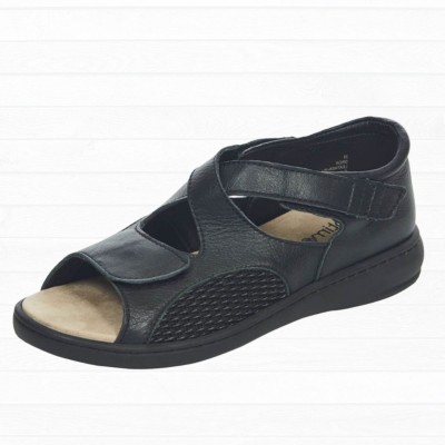 Sandale orthopédique en cuir de couleur noire à semelles amovibles.